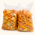 Calabaza fresca cortada en cubos Los Nietos, presentación de 10 kg en bolsas transparentes.