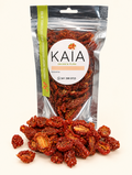 Tomates cherry deshidratados con provenzal KAIA, envase de 60 g sobre fondo crema.