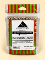Pimienta blanca en grano, presentación de 50 g: frente del envase sobre fondo crema.
