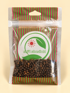 Pimienta negra en grano, presentación de 50 g: dorso del envase sobre fondo crema.