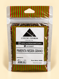 Pimienta negra en grano, presentación de 50 g: frente del envase sobre fondo crema.